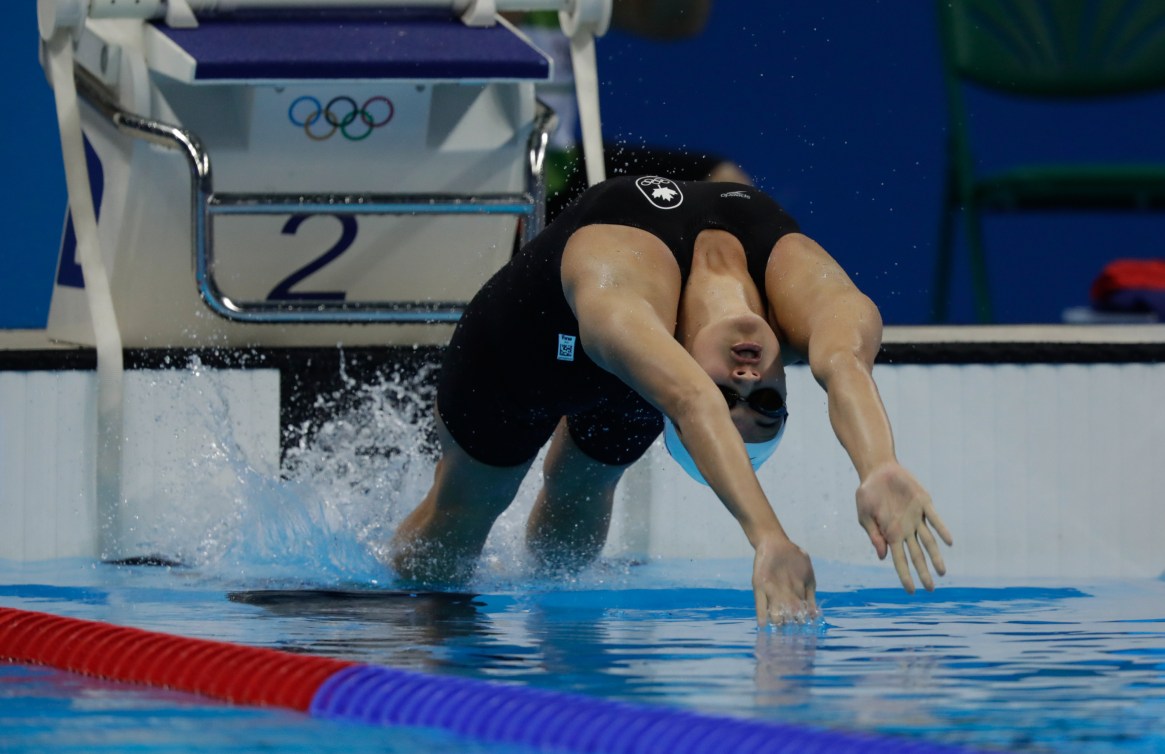 Kylie Masse starting a backstroke race