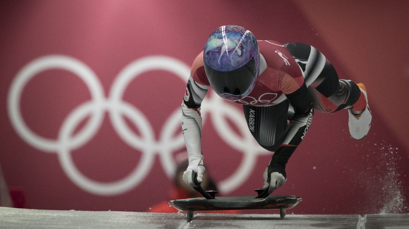 Skeleton athlete starting her run