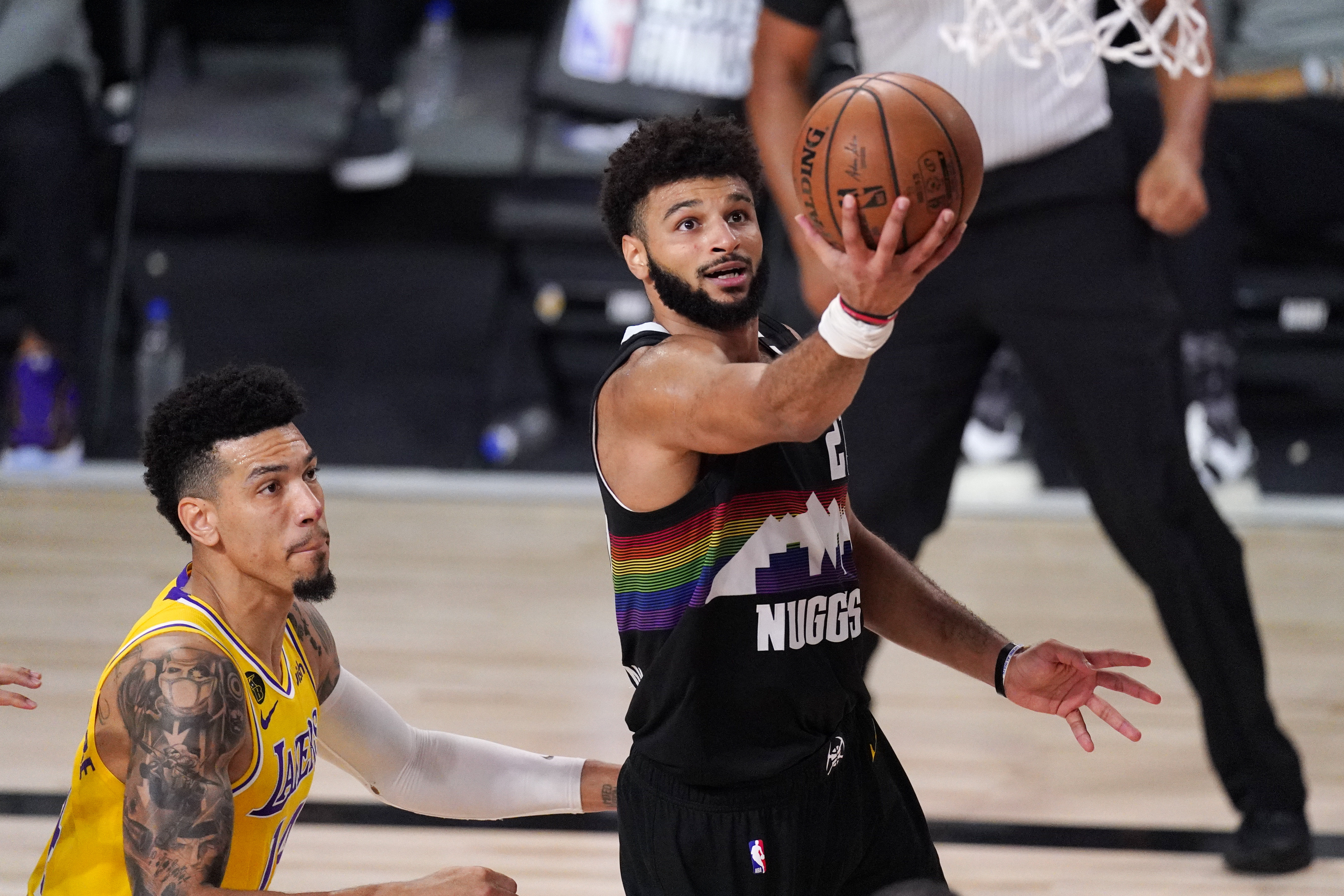 Basketball player attempts a layup 