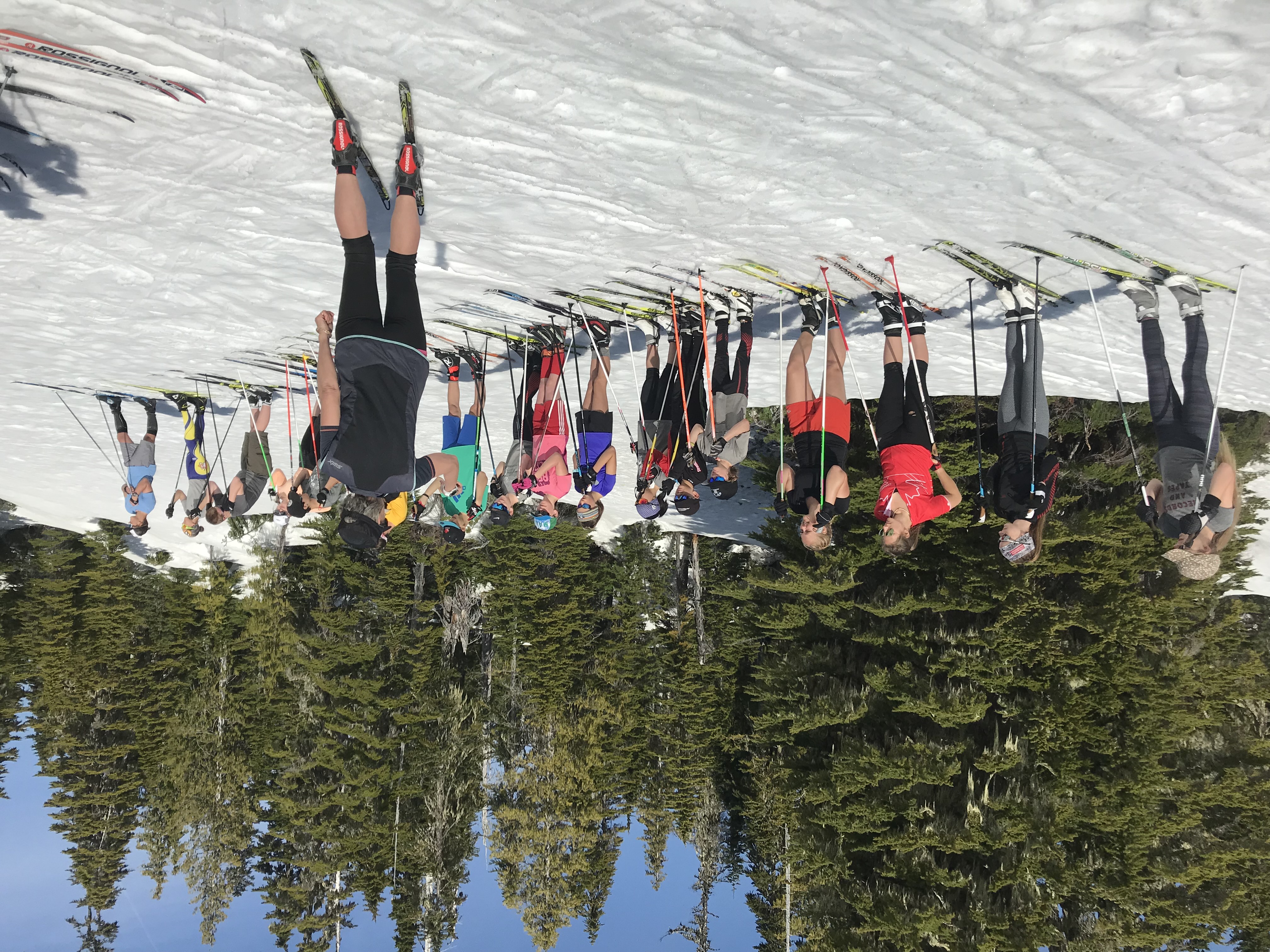 Cross country skiing coach with youth