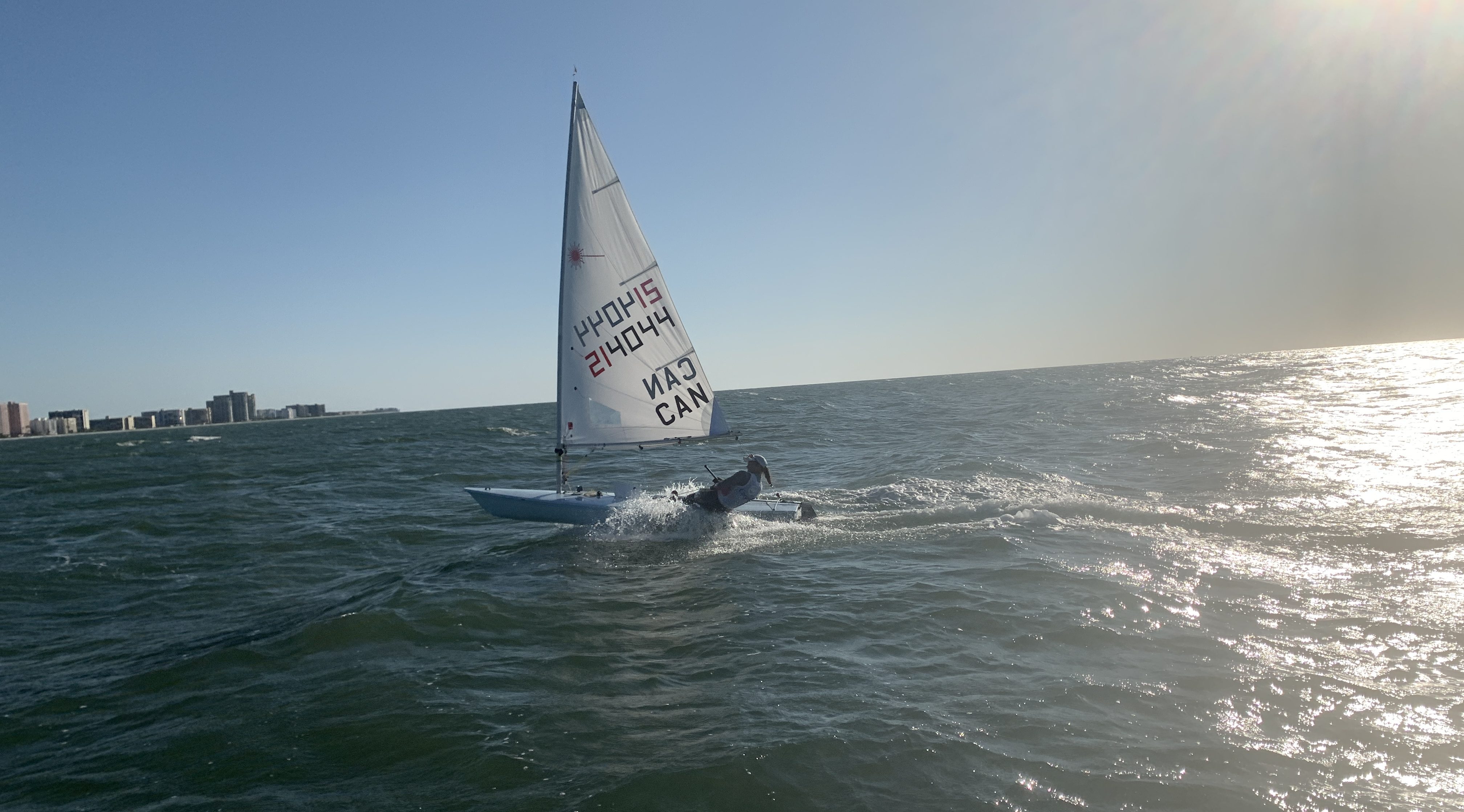 Wide shot of a sailor on the water