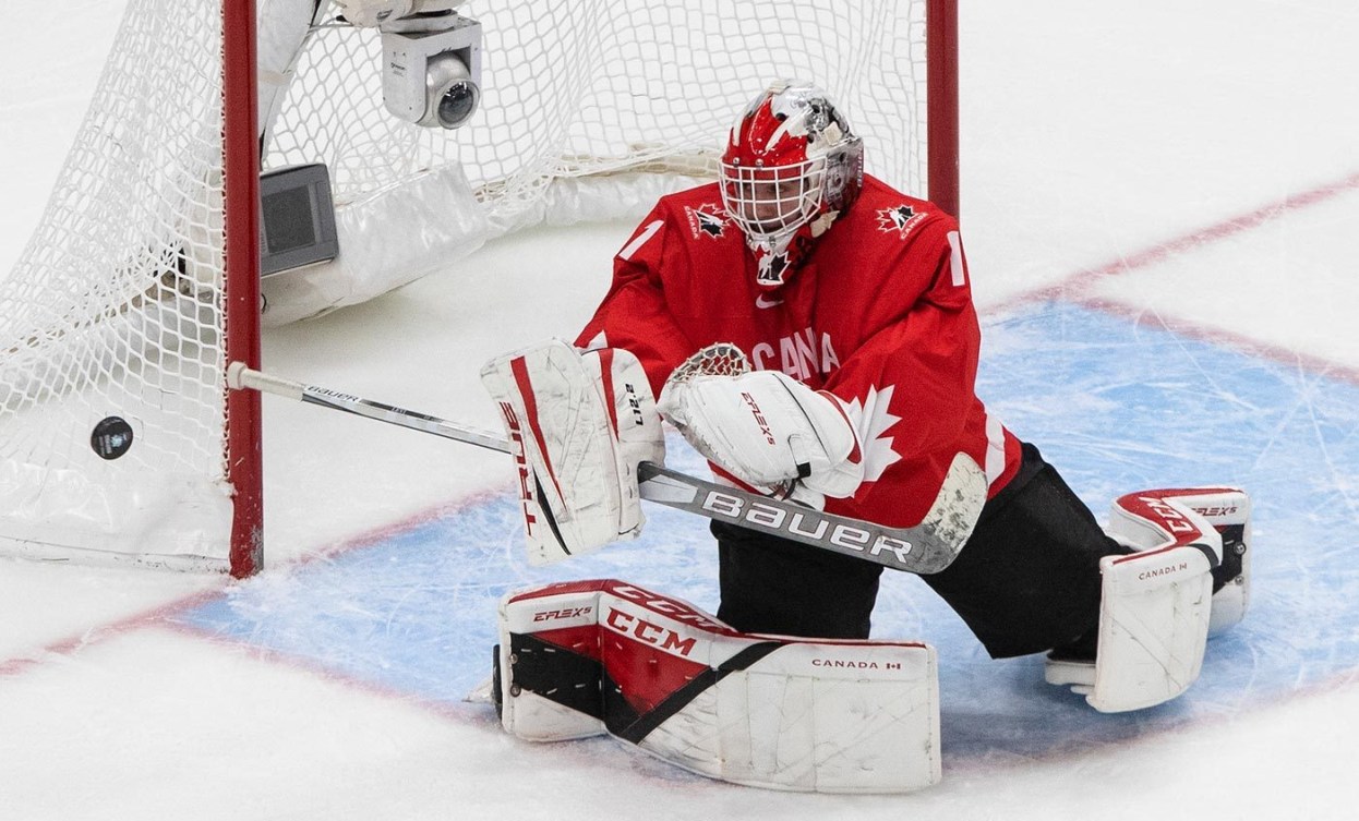 Canada goalie Devon Levi (1) makes the save against the United States during first period IIHF World Junior Hockey Championship gold medal game action in Edmonton on Tuesday, January 5, 2021. THE CANADIAN PRESS/Jason Franson