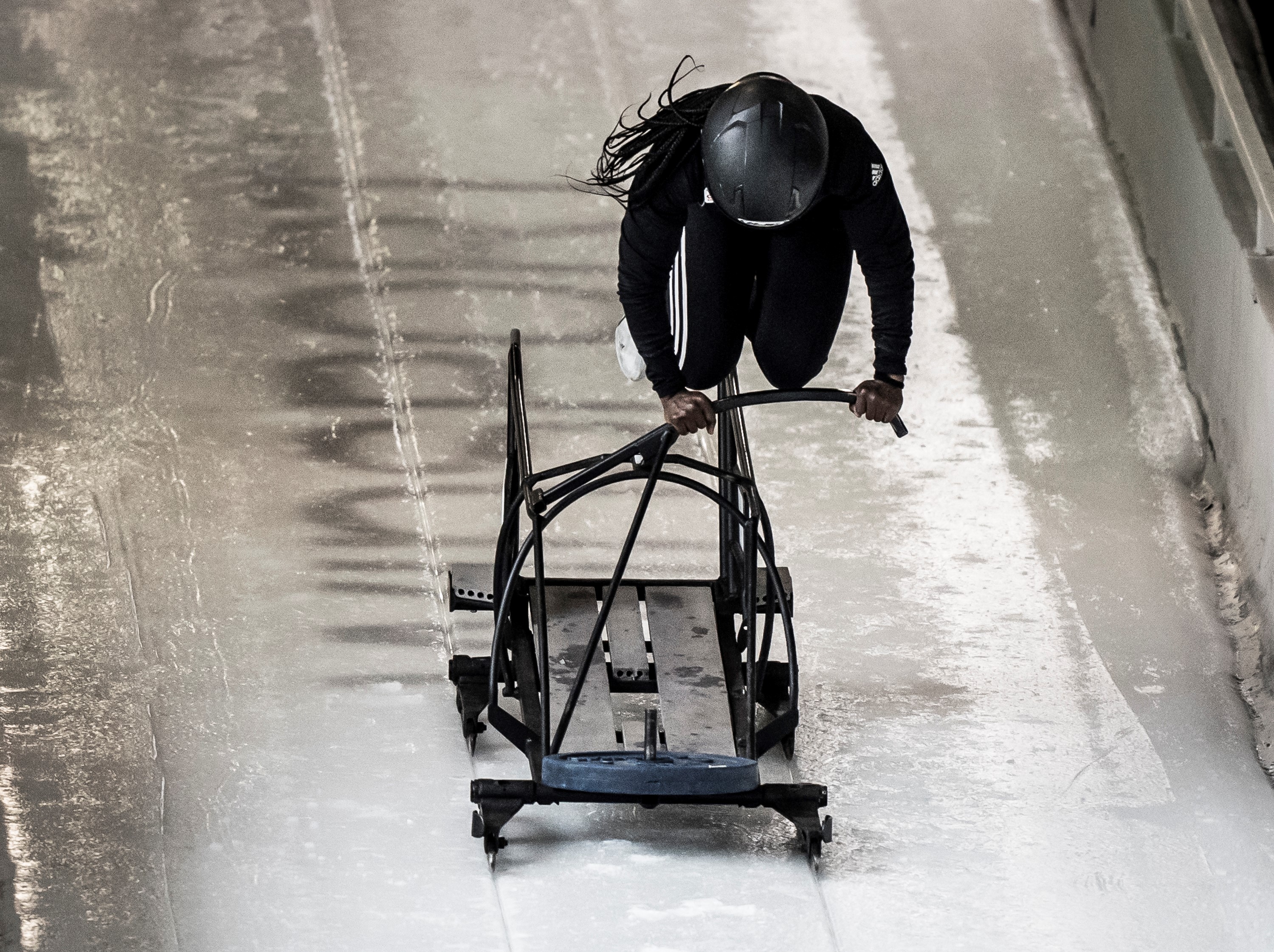 Cynthia Appiah pushing a monobob training sled