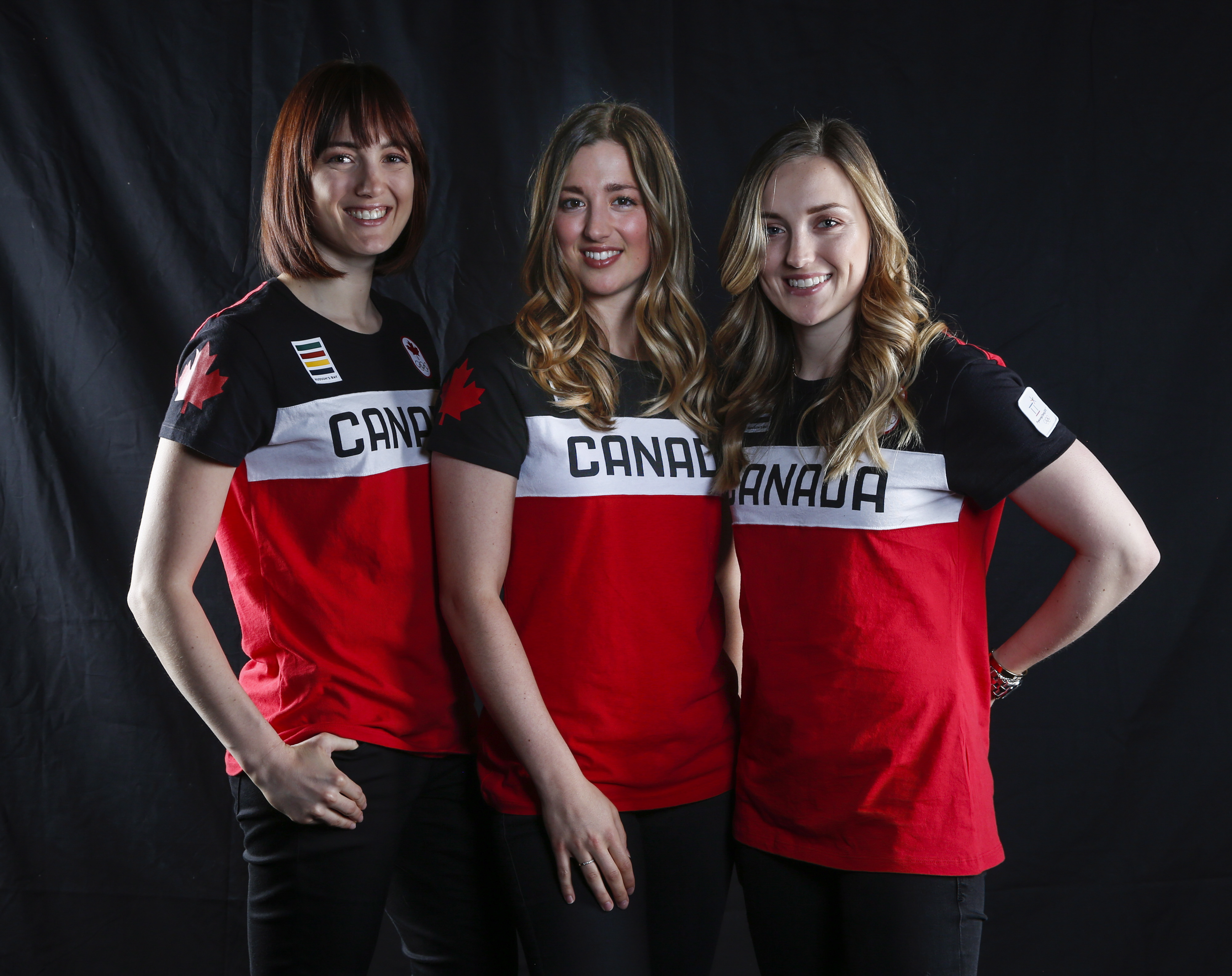 Canadian Olympic athletes, left to right, Maxime Dufour-Lapointe, Chloe Dufour-Lapointe, and Justine Dufour-Lapointe poses for a photo at the Olympic Summit in Calgary, Alta., Saturday, June 3, 2017.