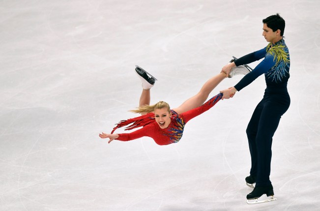 Marjorie Lajoie,Zachary Lagha Man swings female partner in ice dance