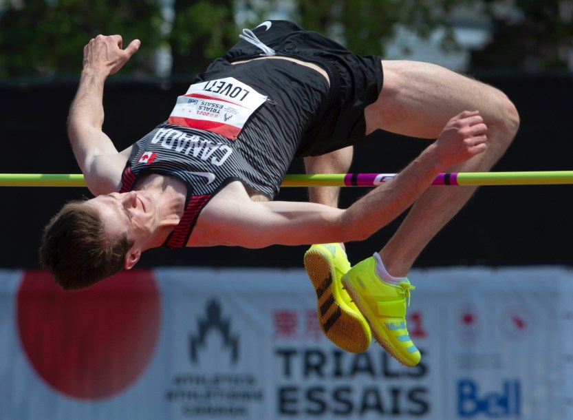 Django Lovett, from Surrey, B.C., clears 2.29m on his way to winning the Men's High Jump final on Sunday, June 27, 2021 at the Canadian Track and Field Olympic trials in Montreal. THE CANADIAN PRESS/Ryan Remiorz.