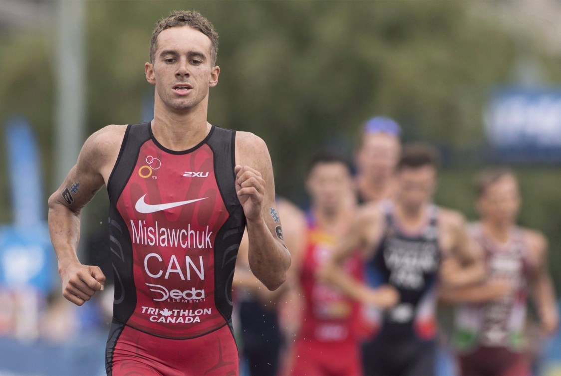 Tyler Mislawchuk of Canada competes during the ITU World Triathlon Series race in Montreal, Sunday, August 26, 2018. Tyler Mislawchuk became the first Canadian man to win a World Triathlon Series race when he claimed gold in an Olympic test event on Friday.The 23-year-old from Oak Bluff, Man., completed the race in one hour 49 minutes and 51 seconds, four seconds ahead of second-place finisher Casper Stornes of Norway.