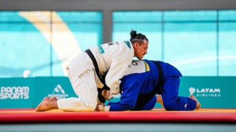 Two judokas grapple with one another
