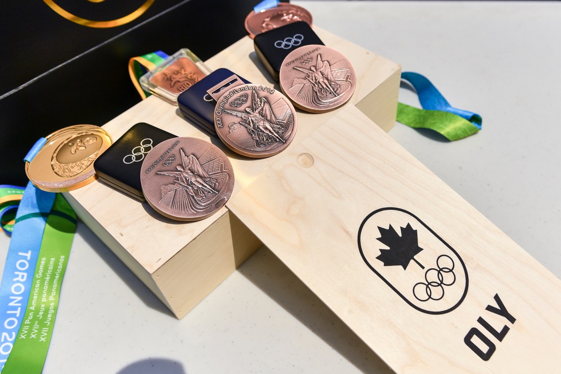 Olympic and Pan Am medals sit ready for presentation