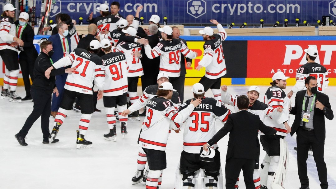 Team Canada celebrates IIHF World Championship gold on June 6 with a 3-2 overtime win over Finland