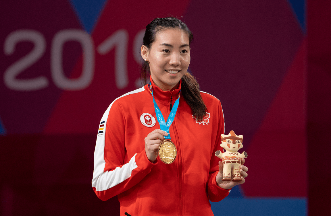 Michelle Li poses with gold medal 