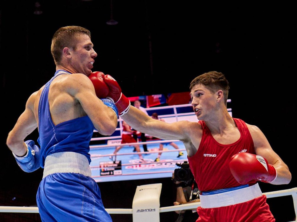 boxer punches someone during match