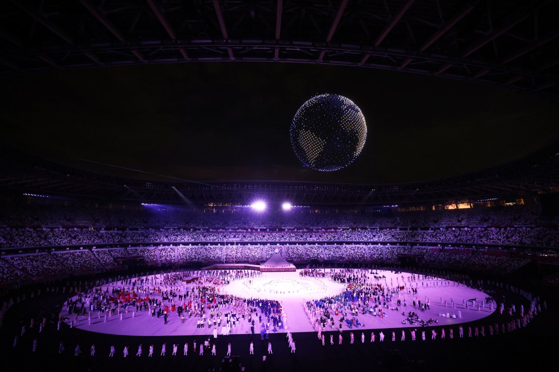 Drones flying high above the Olympic Stadium.