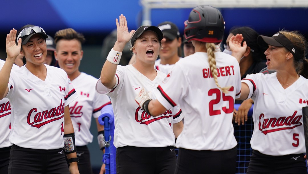 Jennifer Gilbert celebrates with her teammates