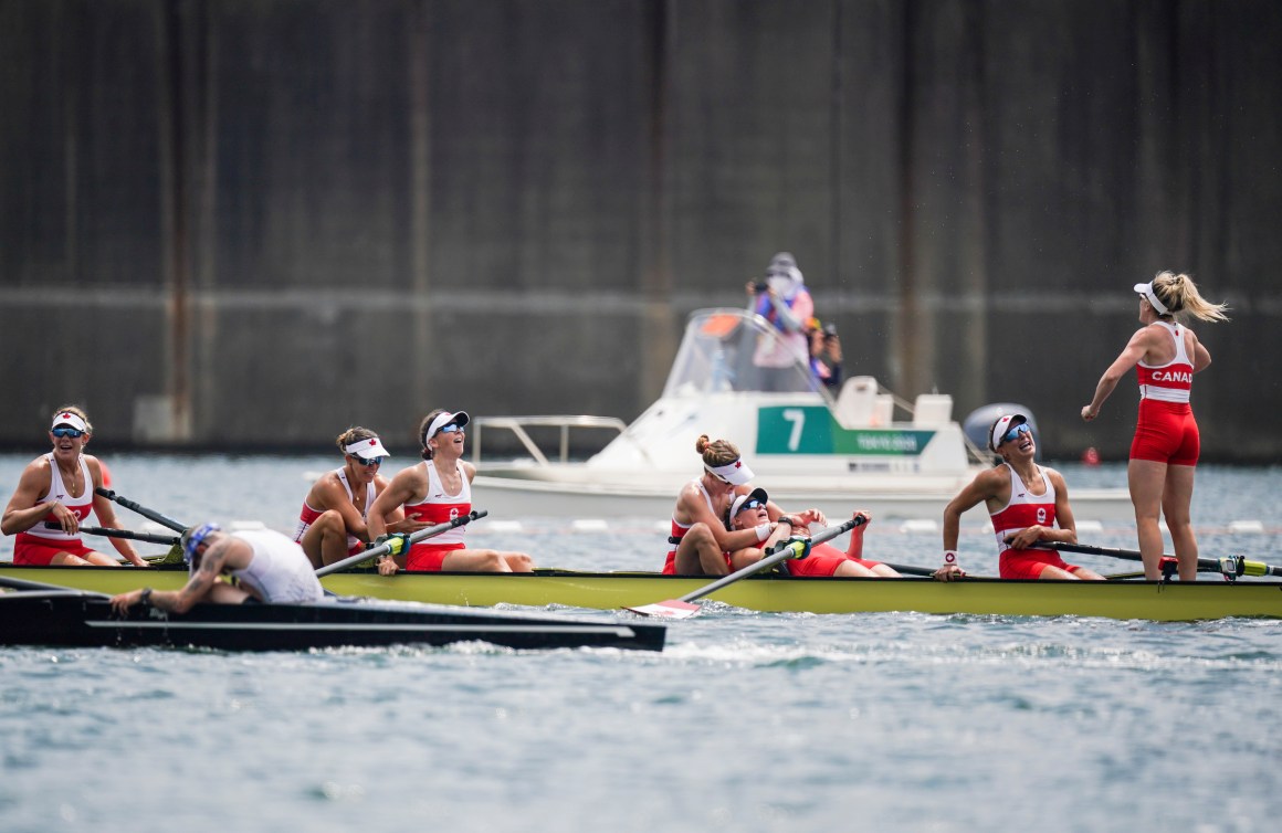 Team Canada celebrates winning the women's eight