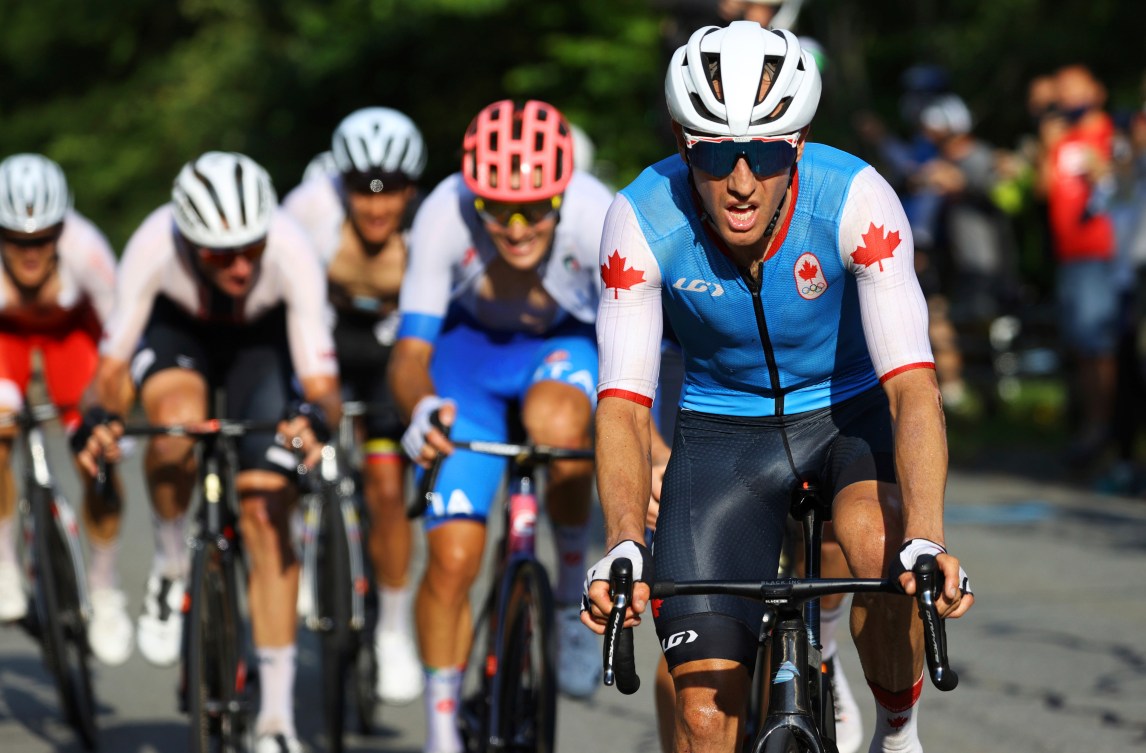 Michael Woods cycling ahead of the other competitors