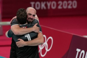 Canada's Nick Hoag and TJ Sanders hug after the match
