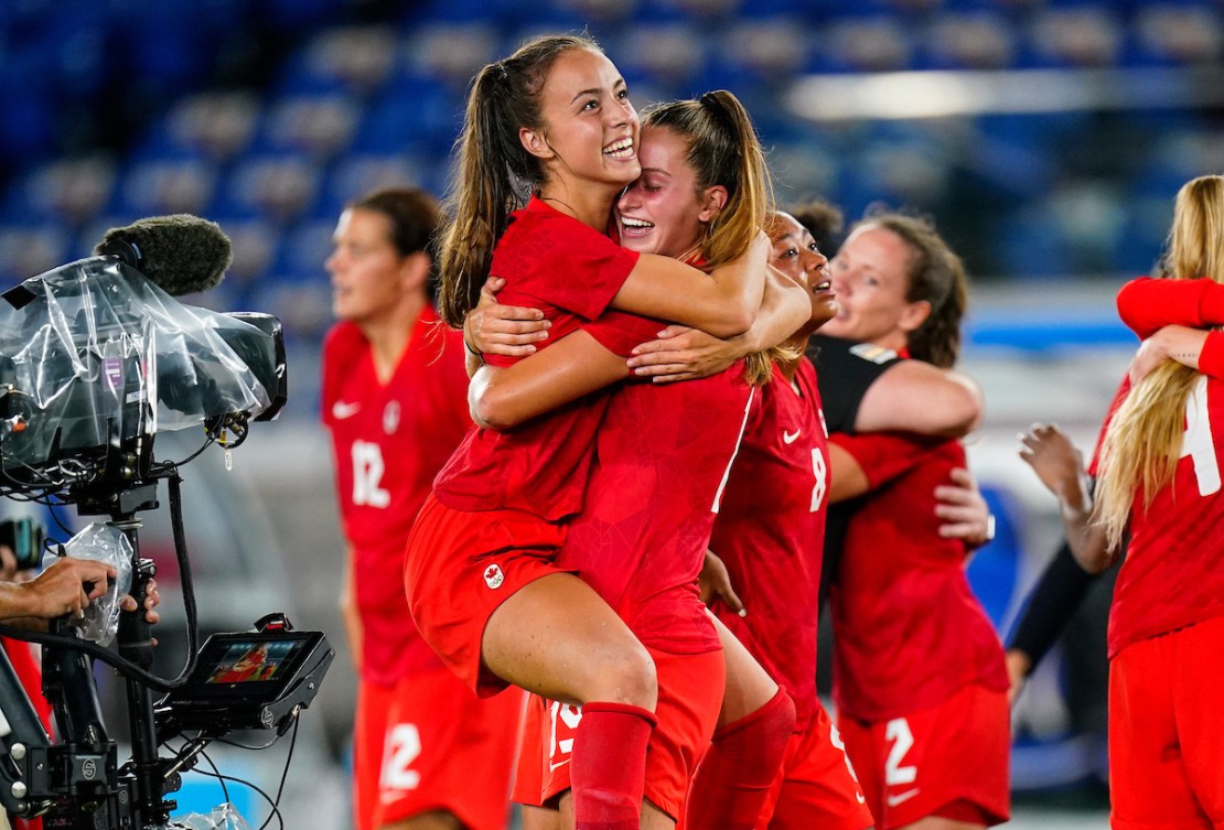 Team Canada Julia Grosso celebrates with teammate Jordyn Huitema 