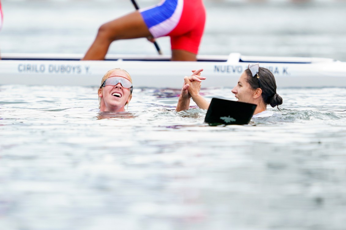 Laurence Vincent Lapointe and Katie Vincent hold hands after falling in the water 