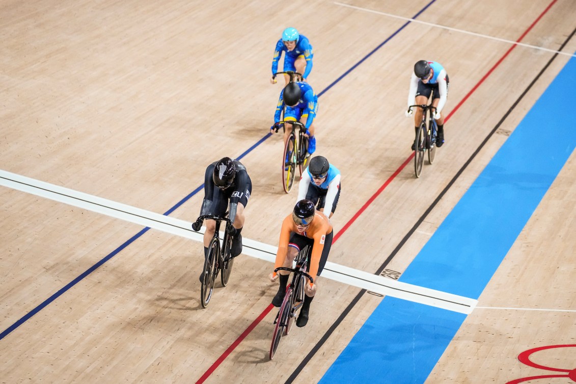 Lauriane Genest crosses the line in third place in track cycling