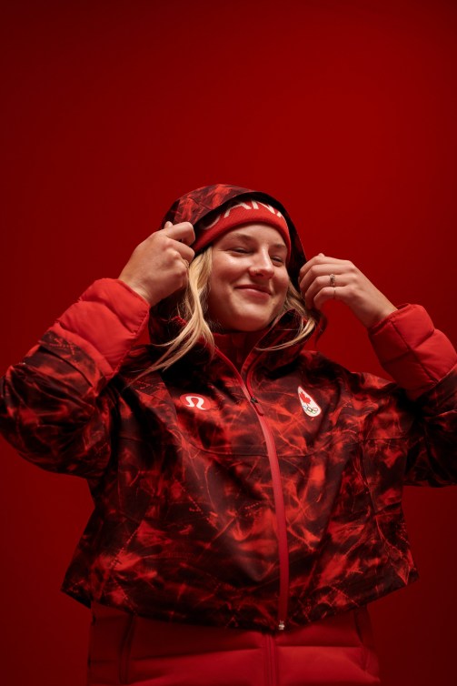 Cassie Sharpe pulls up the hood on a red patterned jacket