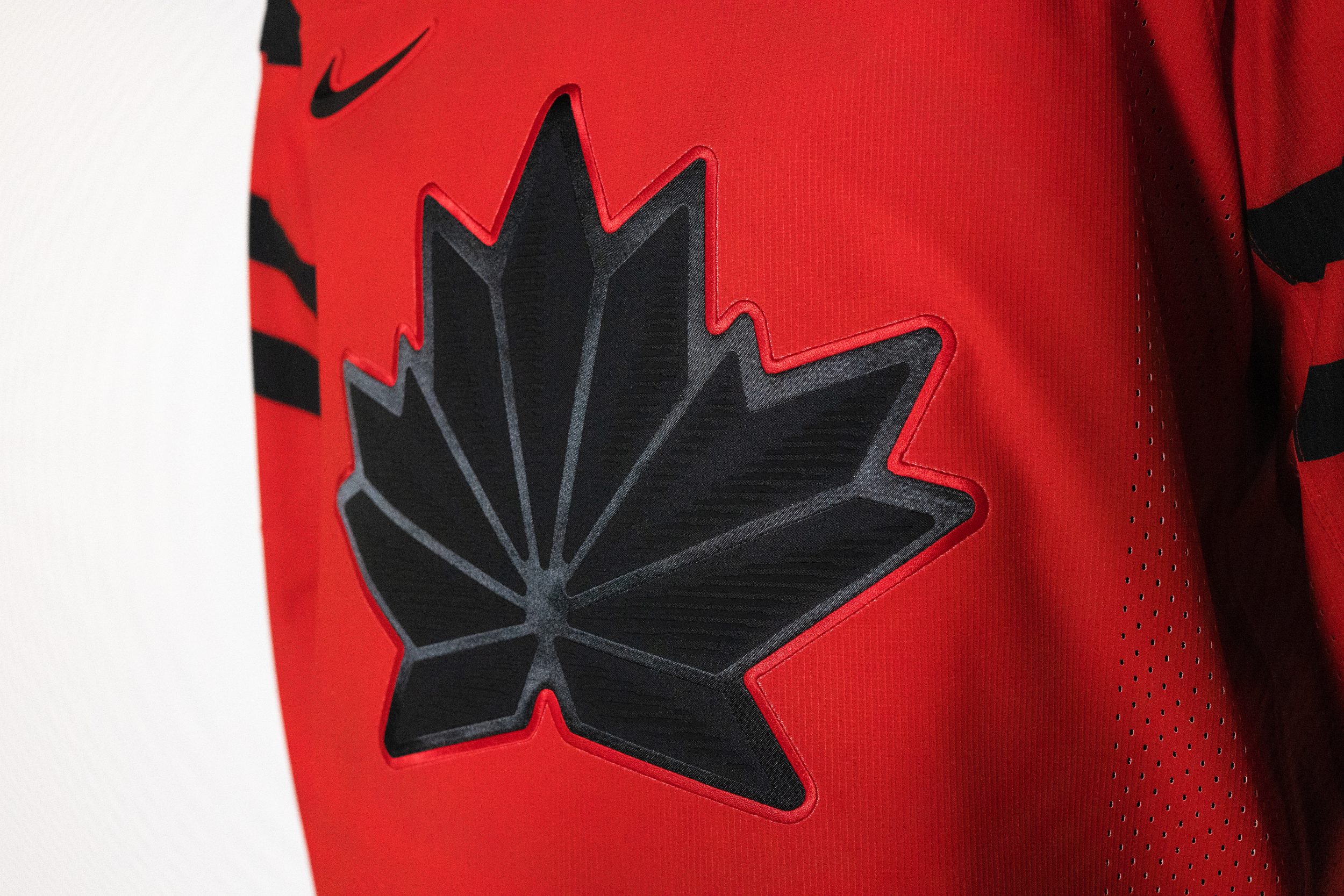 Close up of front of red Team Canada hockey jersey for Beijing 2022