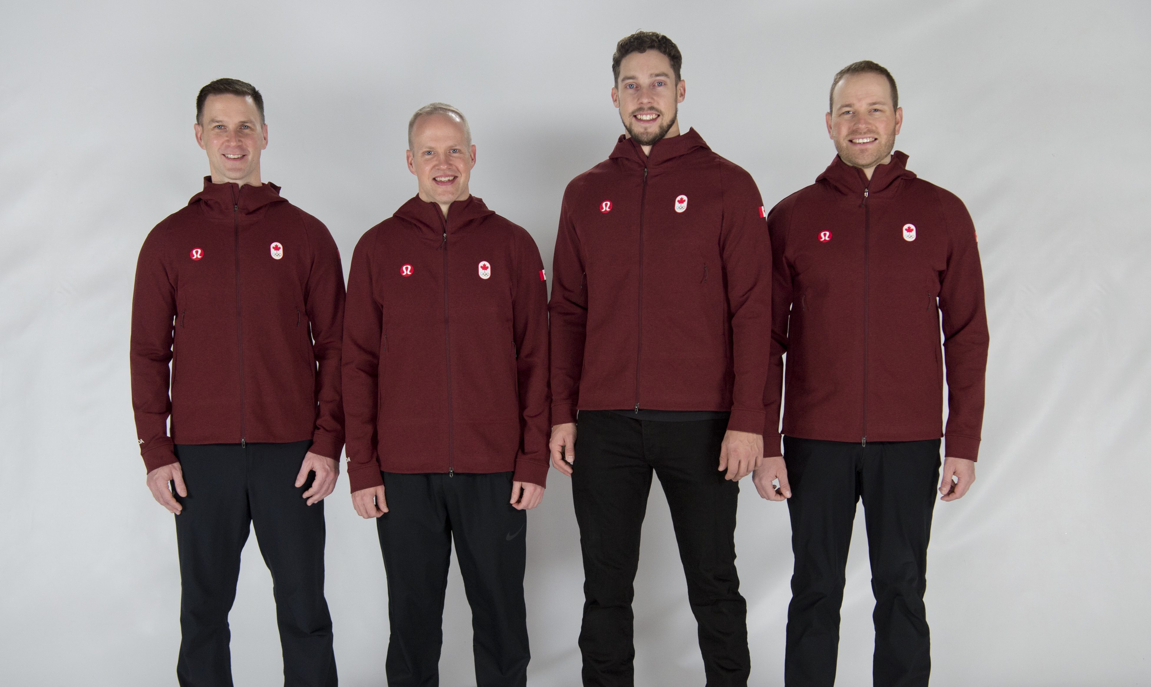 Team Gushue pose in their Team Canada lululemon jackets