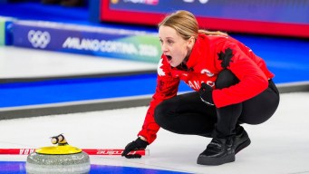 Jocelyn Peterman competes in curling.