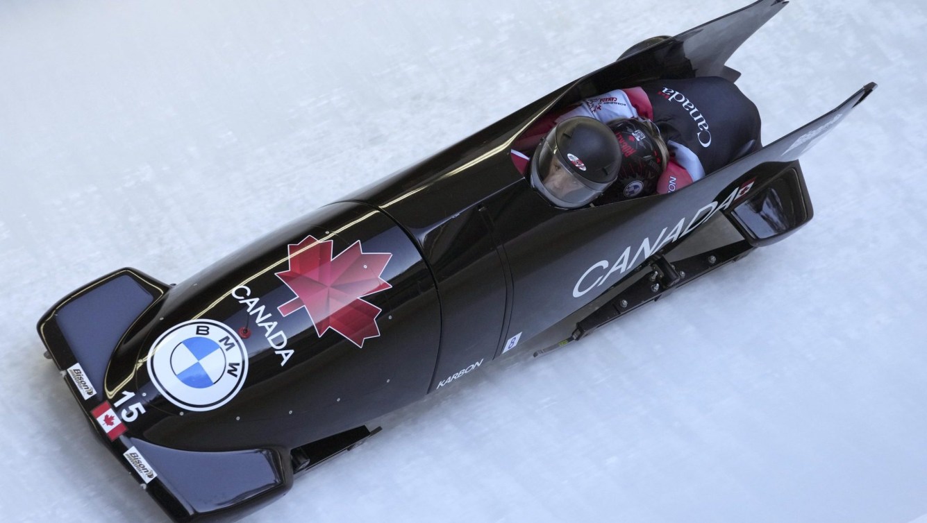 Christine de Bruin and Kristen Bujnowski speed down the track