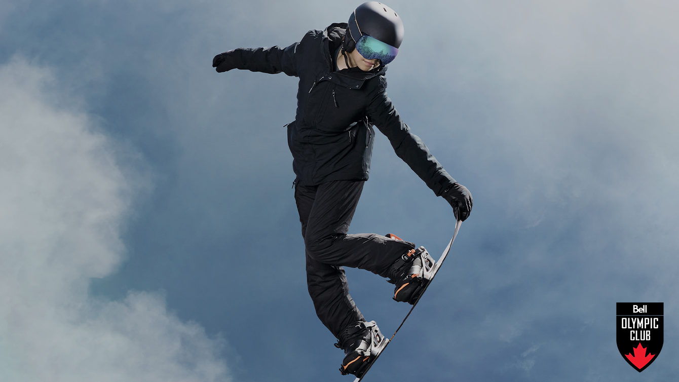 man snowboarding in air