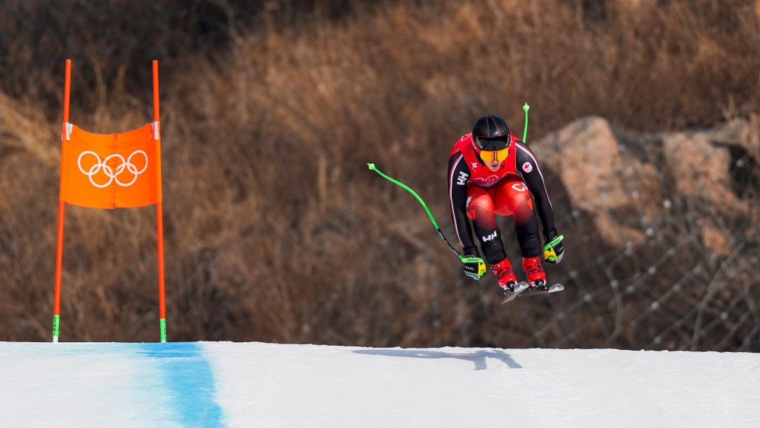 Brodie Seger goes over a jump during an alpine ski race