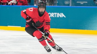 Ella Shelton competes in ice hockey.