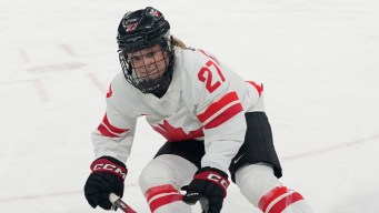 Emma Maltais competes in ice hockey.
