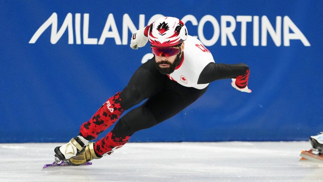 Stevn Dubois competes in short track speed skating.