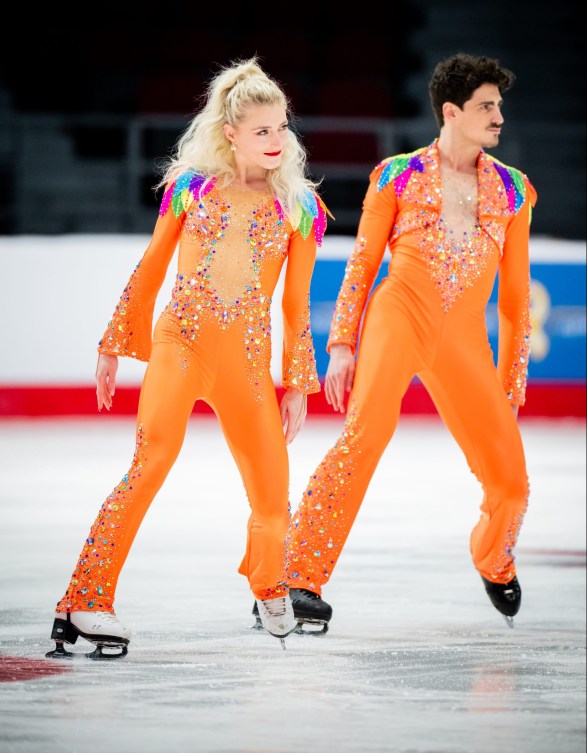 Piper Gilles and Paul Poirier dance side by side