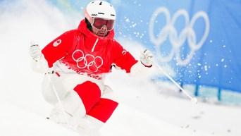 Laurent Dumais skis through moguls bumps