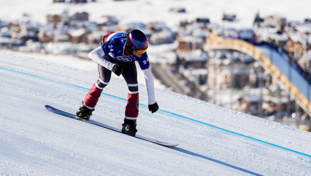 Liam Moffatt competes in snowboard cross.
