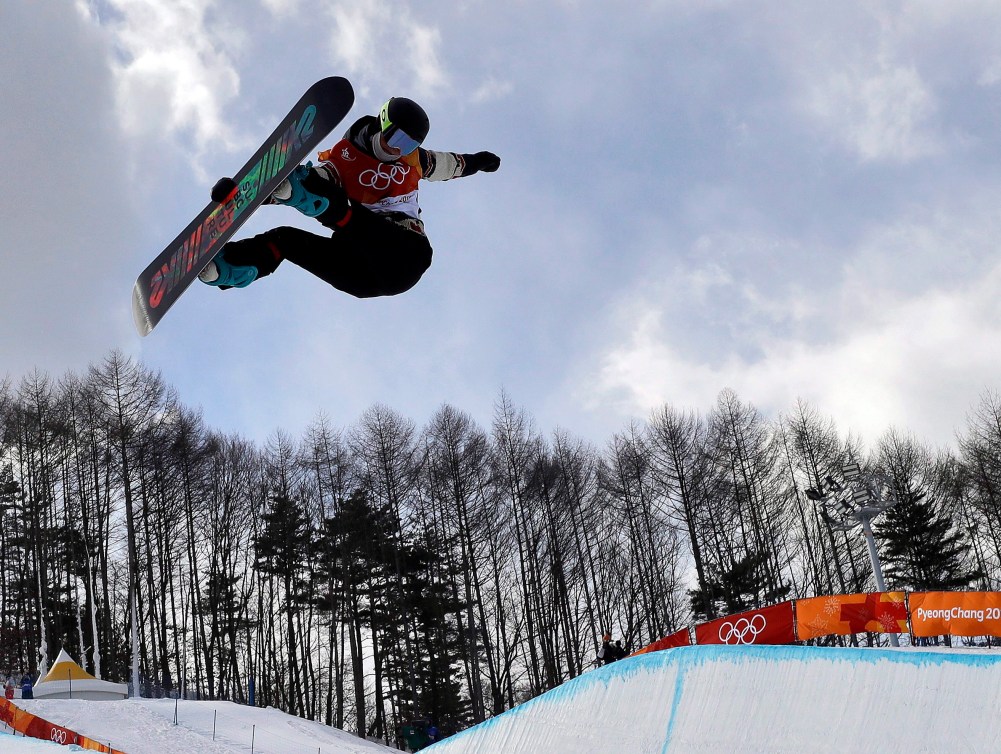 Elizabeth Hosking, of Canada, jumps during the women's halfpipe qualifying at Phoenix Snow Park at the 2018 Winter Olympics in Pyeongchang, South Korea, Monday, Feb. 12, 2018. 