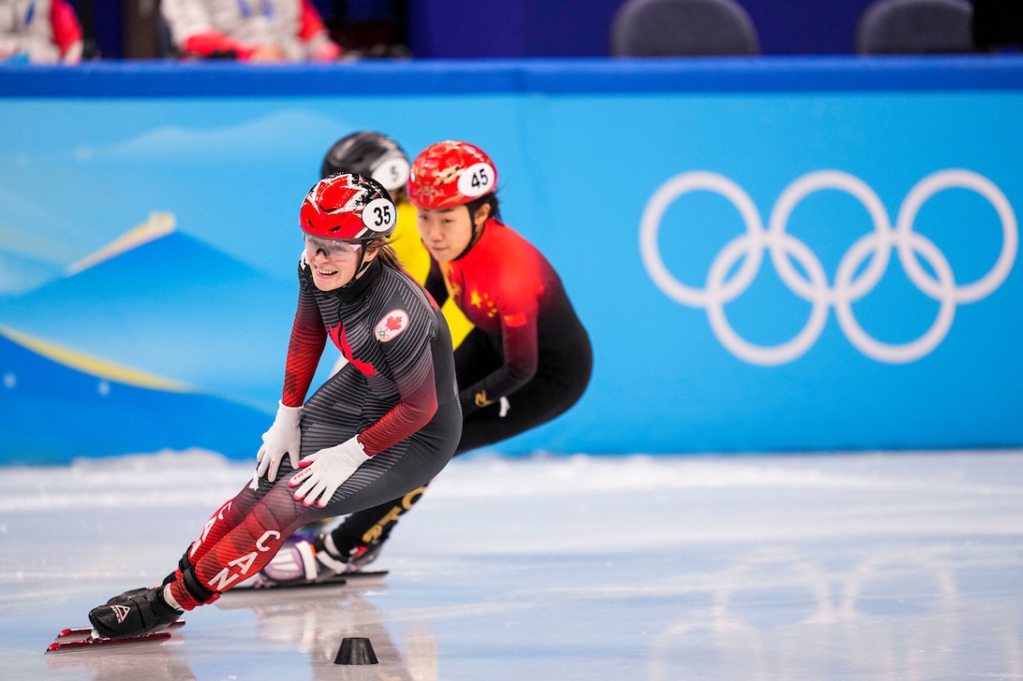 Team Canada short track speed skater Kim Boutin celebrates after winning the bronze medal in the women’s 500m semifinals