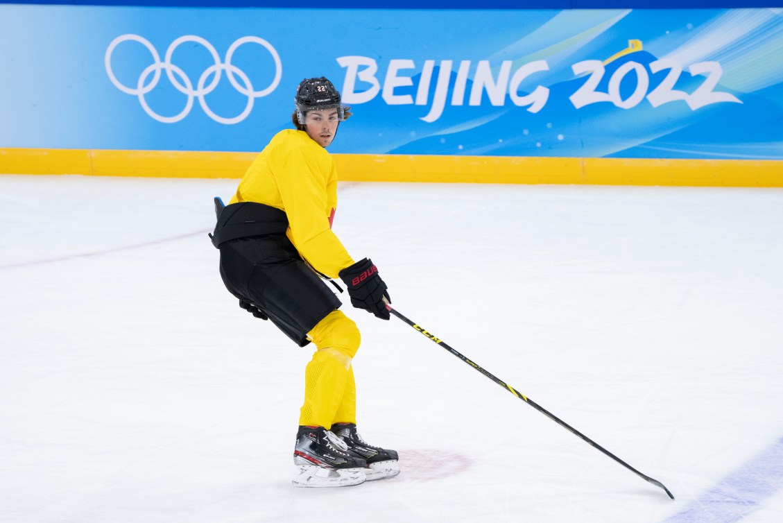 Team Canada defender Owen Power skates during a practice