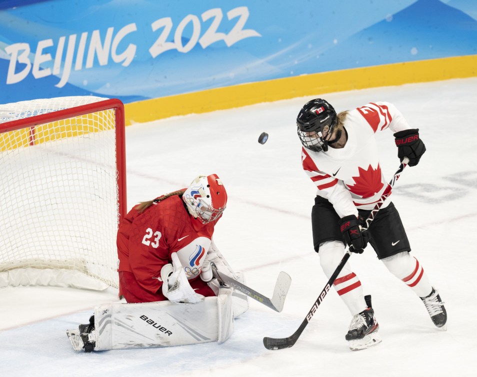 Canada forward Laura Stacey (7) is stopped by Russian Olympic Committee goalkeeper Darya Gredzen (23)