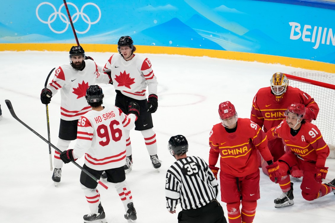 Canada forward Eric O'Dell (19) celebrates his goal