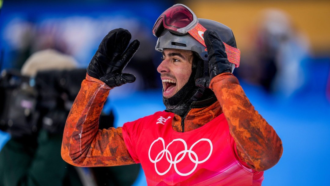 Eliot Grondin lifts his hands to his head in happy reaction