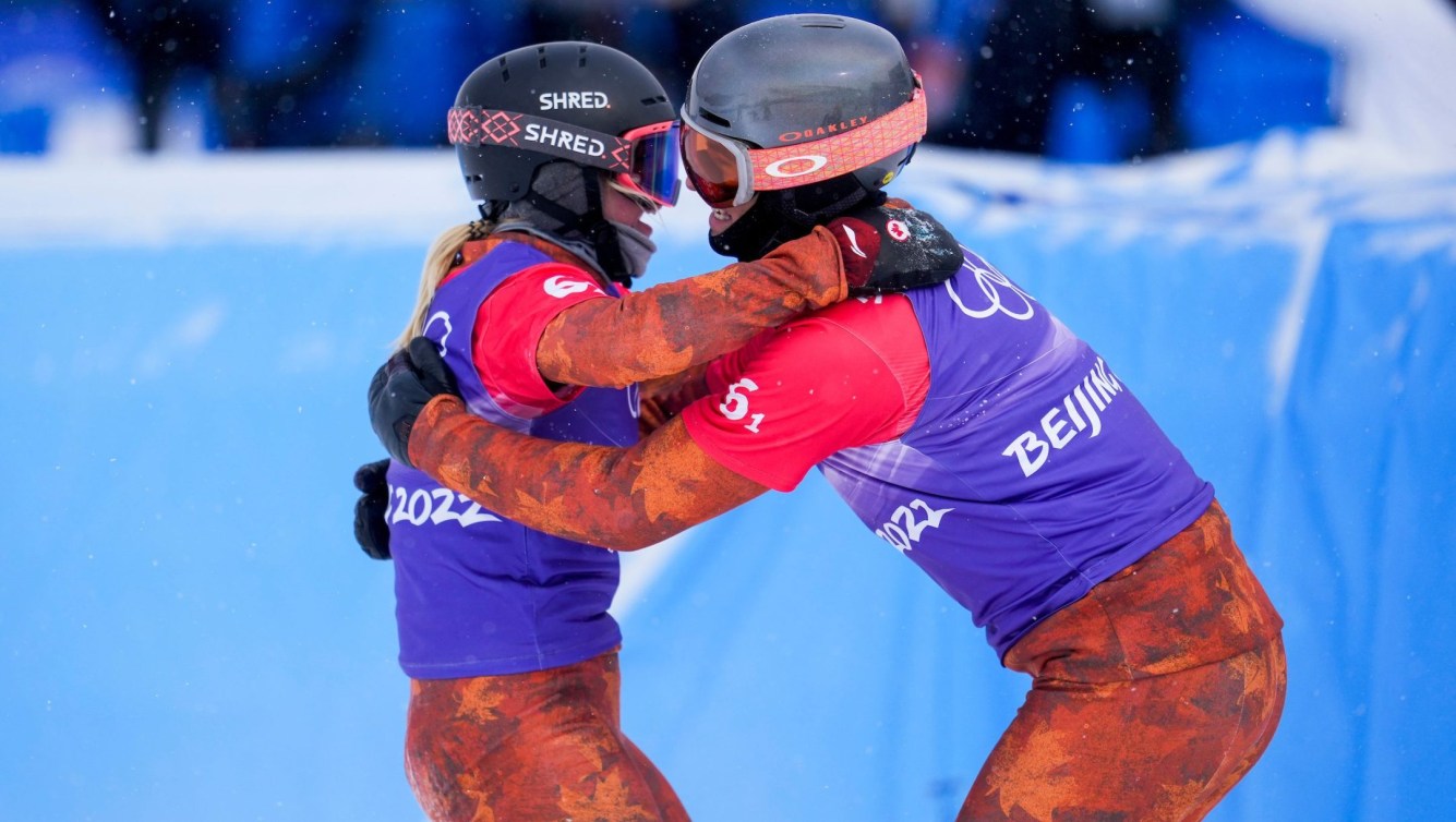 Grondin and O'Dine hug at the finish line