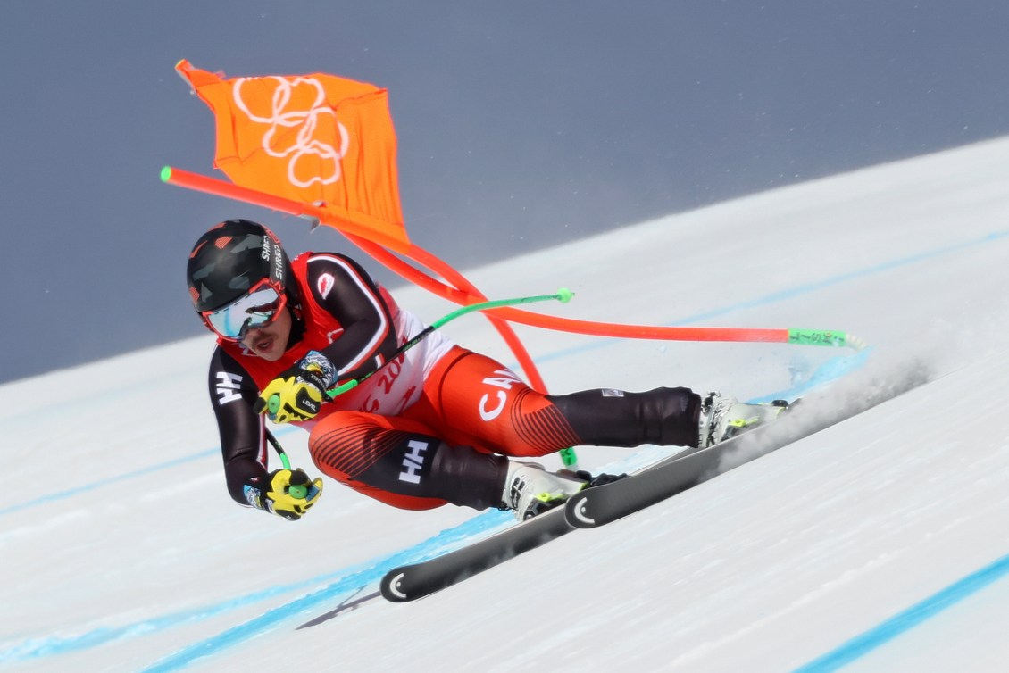 Jack Crawford skis past a gate in the downhill 