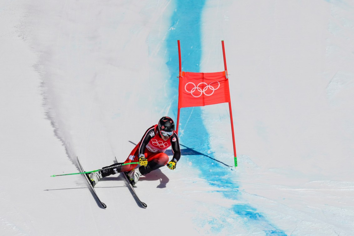 Jack Crawford skis past a gate in the super-G