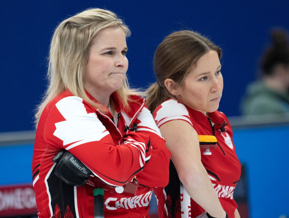 Jennifer Jones and Kaitlyn Lawes look on disappointed