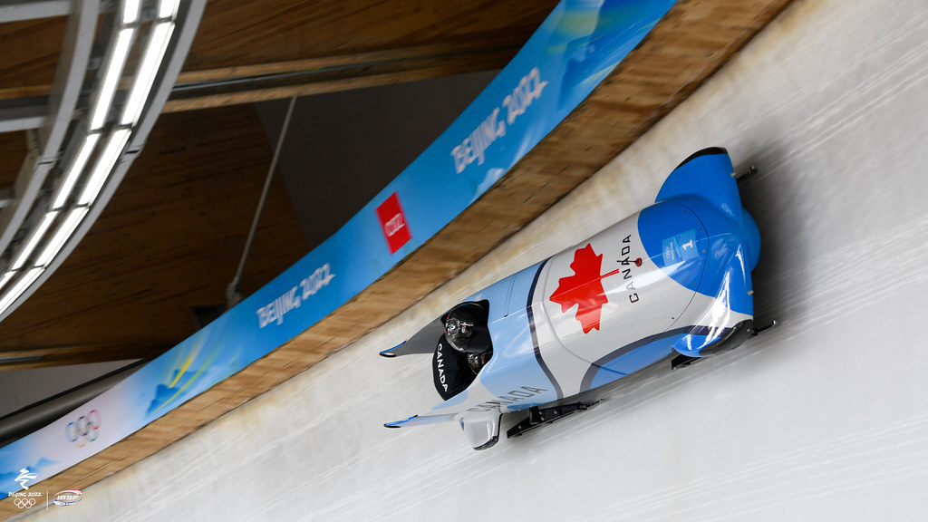 Canadian bobsled going down a track