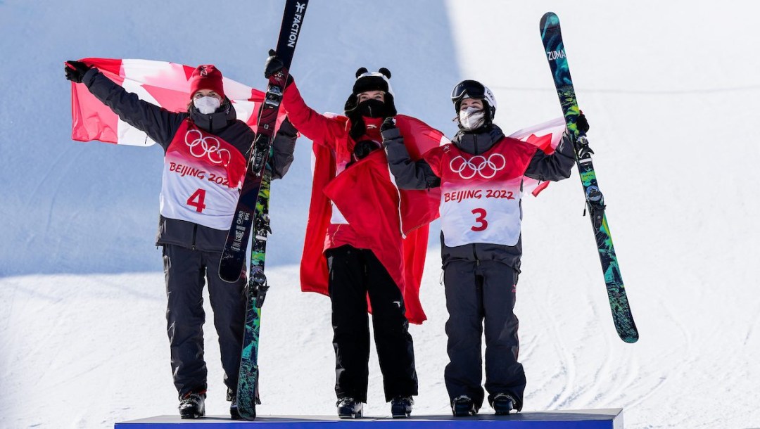 Rachael Karker and Cassie Sharpe of Canada with Eileen Gu of China on the podium.