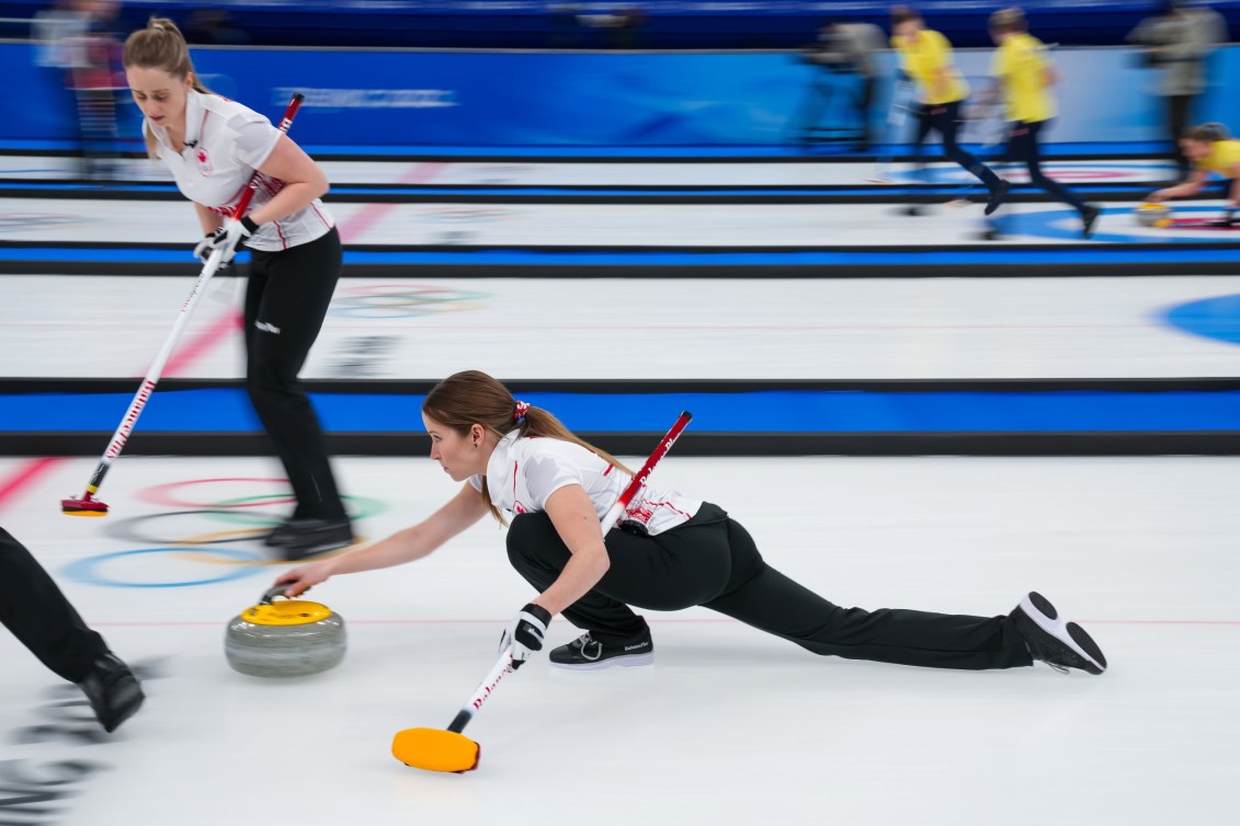 Kaitlyn Lawes throws a stone